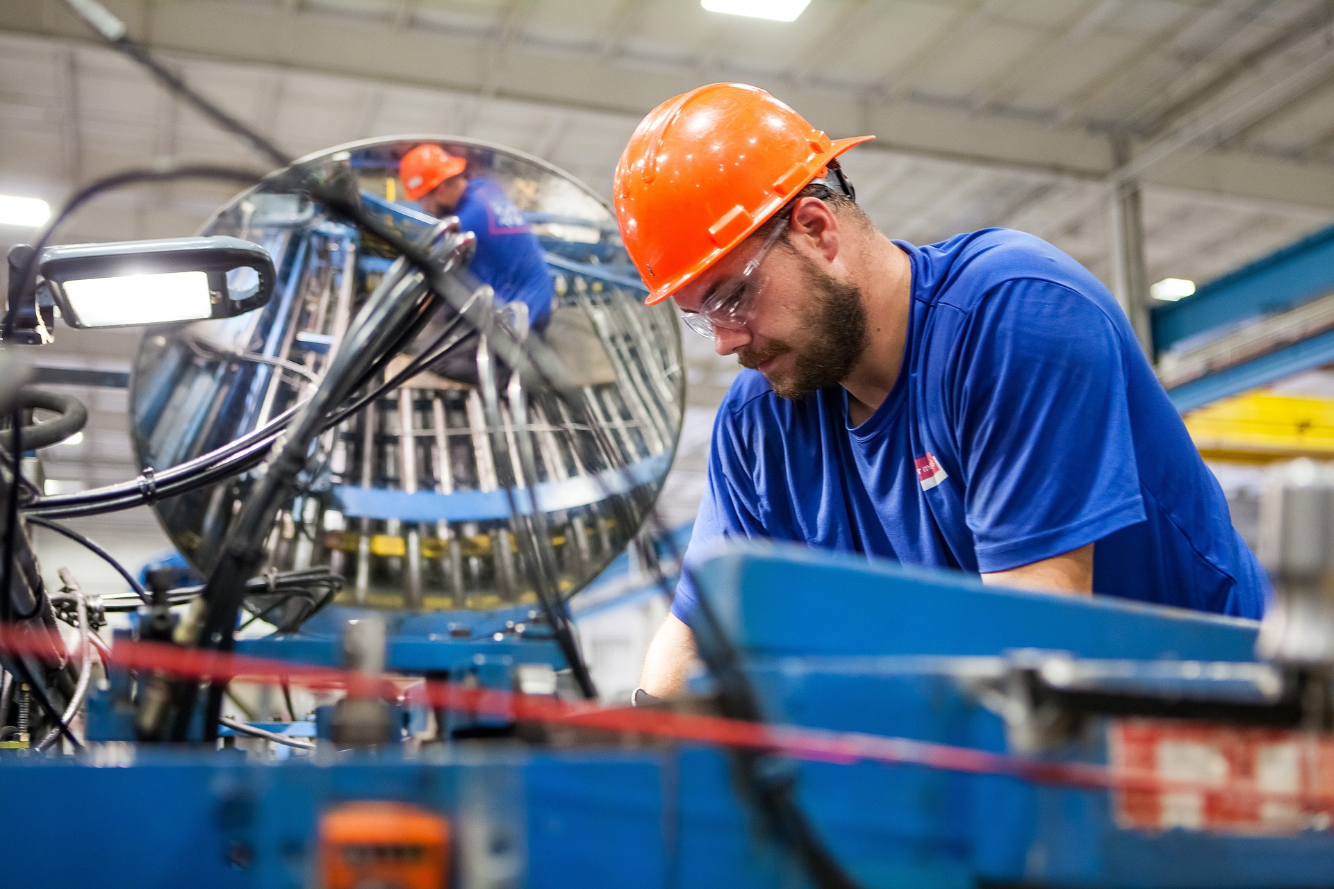 Worker wearing safety equipment to avoid a Traumatic Brain Injury at the Workplace