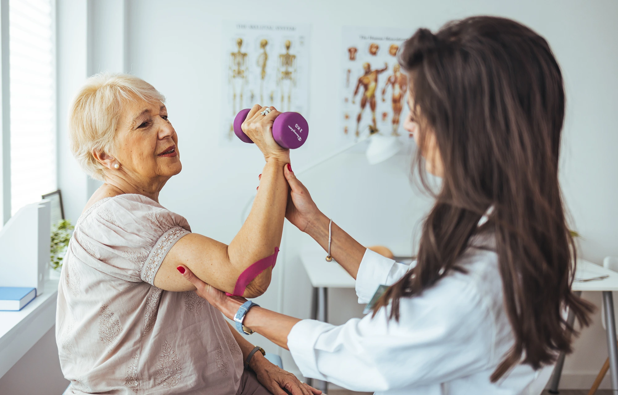 Occupational therapist guiding a patient through TBI occupational therapy activities to improve coordination, cognitive skills, and daily living independence.